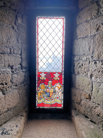 Stained glass window in the medieval castle of Caernarfon in North Walesのeditorial素材