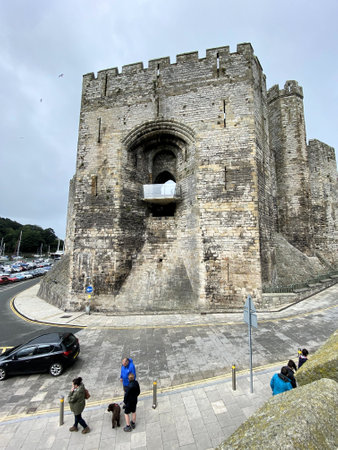 A view of Caernarfon Castle on a rainy day in August 2021.のeditorial素材