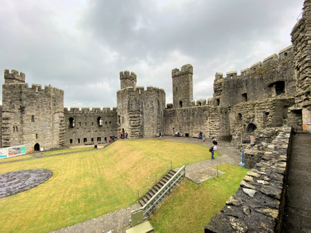 A view of Caernarfon Castle on a rainy day in August 2021.のeditorial素材