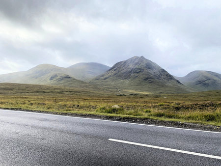 Scenic view of a mountain range on a sunny dayの写真素材