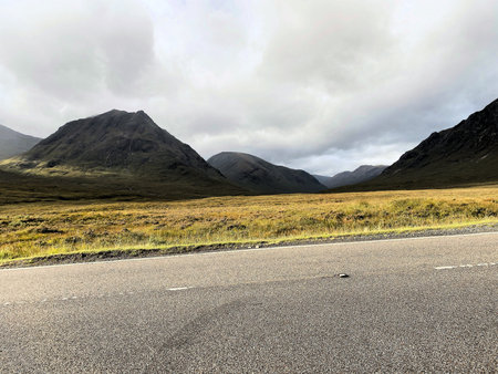 Scenic view of a mountainous landscape on a cloudy dayの写真素材