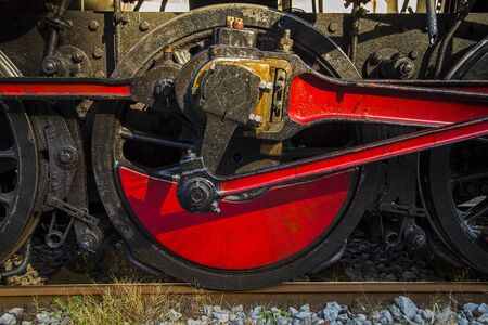 Old steam train - detail of the drive wheel, full frame.の写真素材