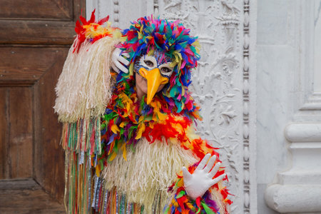 Venice, Italy - February 22, 2017: Single traditional Venetian mask on St. Mark's Square in Venice. Portrait of a woman wearing a mask in Venice during the carnival daysのeditorial素材