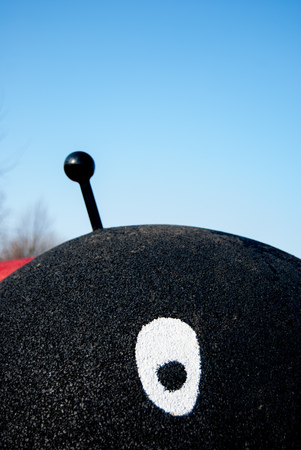 Eyes and antennas of a ladybird in a of a game for children at the playgroundの写真素材