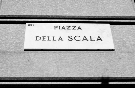 Municipal marble plaque engraved with the writing of della Scala place in Milan - Italyの写真素材