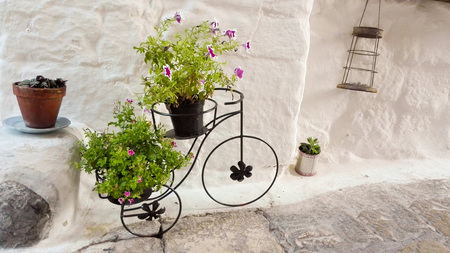 An original holders of plants in a street of Otranto - Pugliaの写真素材