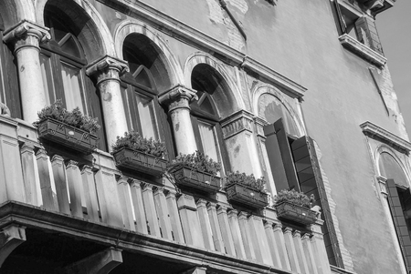 Glimpse on characteristic windows in Venice cityの写真素材