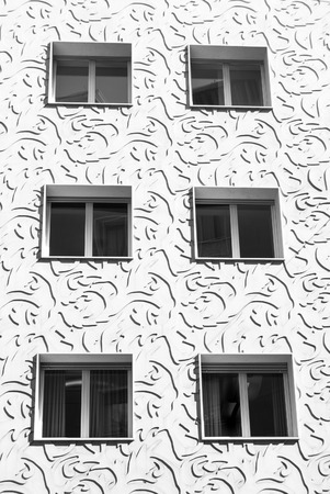 Six windows and geometric decorations on a the palace of Norwegian Consulateの写真素材