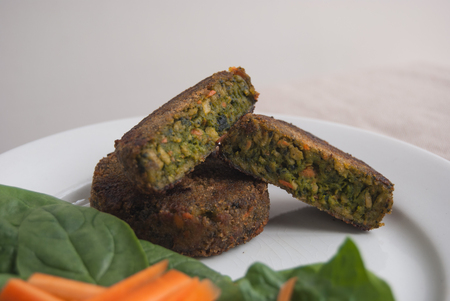 Close up of a vegan food composition with mix of chopped vegetablesの写真素材