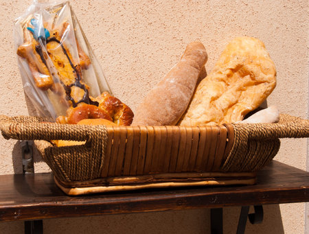 Different type of typical salty and sweet products exposed outside of a shop