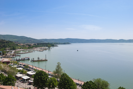 Panorama on Trasimeno lake with pedestrian pathの写真素材