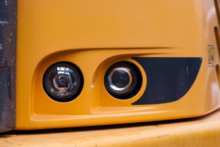Unlit headlights of a big motor vehicleの写真素材