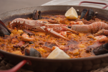 The typical Spanish dish Paella with seafood and shrimpsの写真素材