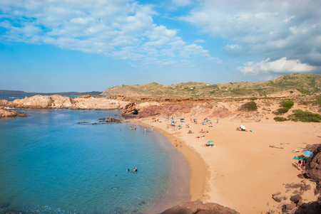 Sand beach with Caribbean sea in the north of Menorca islandの写真素材
