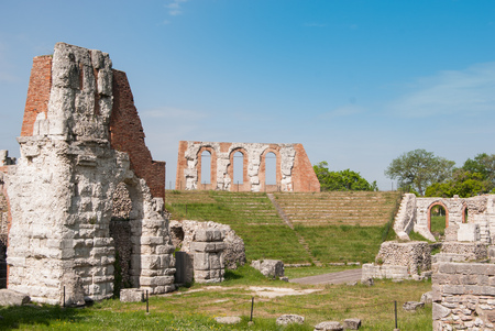 Arches and doors of an ancient Roman theater still well preservedの写真素材
