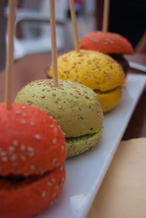 Hamburgers with colored breads as a finger foodsの写真素材