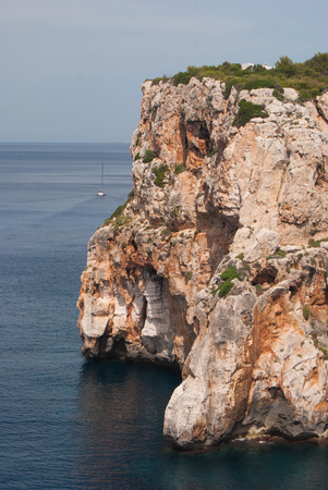 View on a very high cliff over the sea of Menorca the island of Spainの写真素材