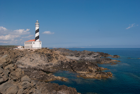 Lighthouse at the east of the island in the middle of a natural reserve in Spainの写真素材