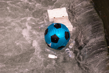 Undifferentiated rubbish grouped in a point of the riverの写真素材