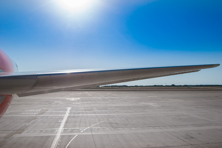 Part of a plane stoped at the airportの写真素材