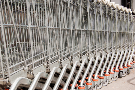 Many carts one behind the other outside a mallの写真素材