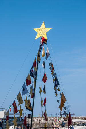Procession of the U Dragun and other colored boats during of Stella marisの写真素材
