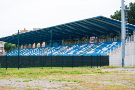 Light blue and plastic seats arranged of a tribuneの写真素材