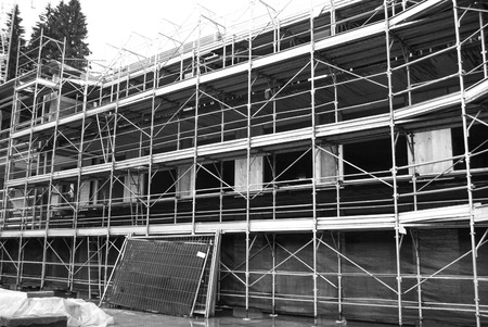 Metal scaffolding of  area under construction and a forbidden to peopleの写真素材