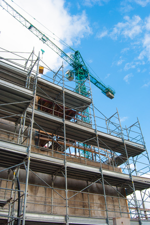 Metal scaffolding of area under construction and a forbidden to peopleの写真素材