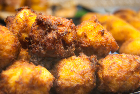 Close-up of crisp potatoes with golden crustの写真素材