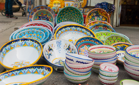 Colorful ceramics exposed outside of a souvenirs shopsの写真素材