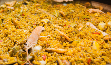 The typical Spanish dish rice with seafood and shrimpsの写真素材
