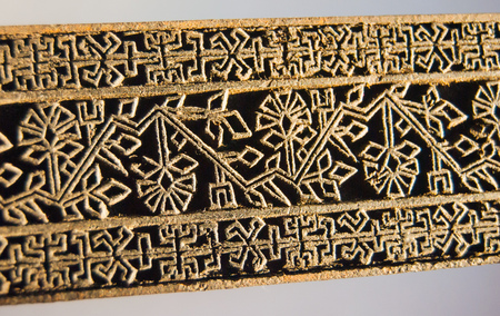 Molds of wooden fabrics with geometrical floral motifsの写真素材