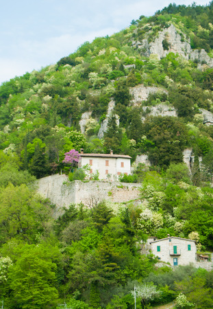 Houses perched on the hills above Gubbioの写真素材