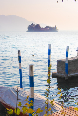 Profile of Little island in the middle of Iseo lake during the sunsetの写真素材