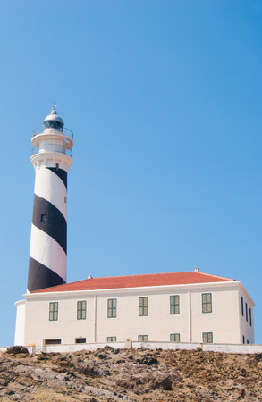 Lighthouse at the east of the island in the middle of a natural reserve in Spainのeditorial素材