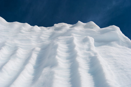 Really big pieces of ice with blue sky