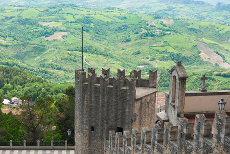 Tower of the first castle with laces and a view over the surrounding hills to the state of San Marinoのeditorial素材