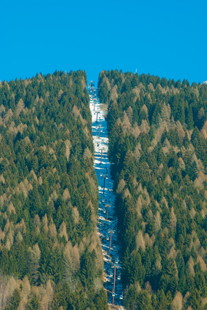 Track of the cable car and blue sky of the Dolomitesの写真素材