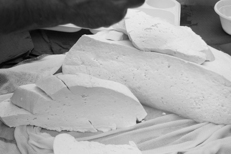 Cheesemaker is going to distributing fresh cheeseの写真素材