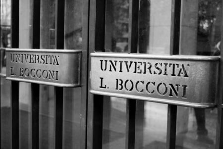 Double handles of the university doors of Managerial economics and legal sciences in black and whiteの写真素材