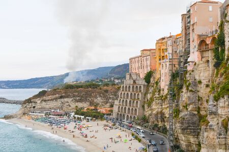 Houses on the rocky cliff and on the beach of the most famous city in Calabria in the south of Italyの写真素材
