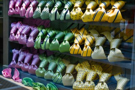 Gradual colors of elegant ties exposed in the shop windowの写真素材