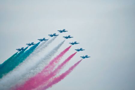 Nine Tricolor Arrows in the air during a day with a little fogの写真素材