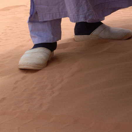 Ubari Desert, Libya - May 04, 2002 : Tuareg feetの写真素材