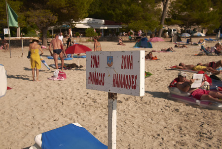 Minorca, Balearic Islands, Spain - September 05, 2013 : Tourists in Cala Galdana, Minorcaのeditorial素材