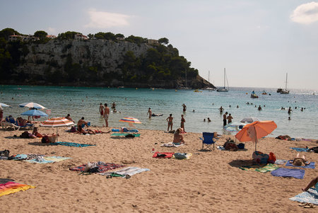 Minorca, Balearic Islands, Spain - September 05, 2013 : Tourists in Cala Galdana, Minorcaのeditorial素材