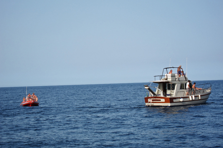 San Vito Lo Capo, Italy - September 01 2011: Boat sailing in 'Riserva dello Zingaro'のeditorial素材