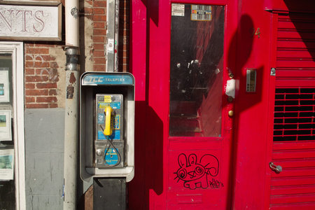 New York, United States - October 02, 2008: Public phone in the street of New York Cityのeditorial素材