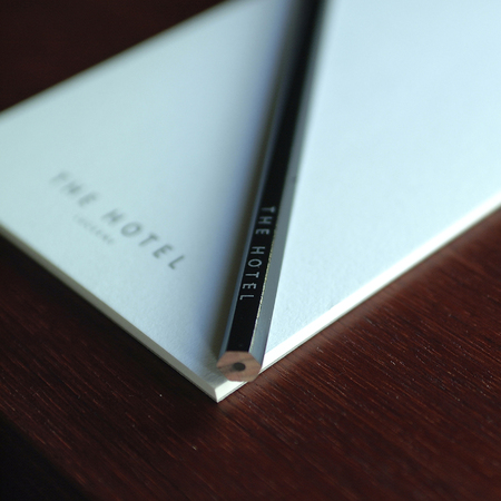 Luzern, Switzerland - April 18, 2002: 'The Hotel' block notes and pencilのeditorial素材